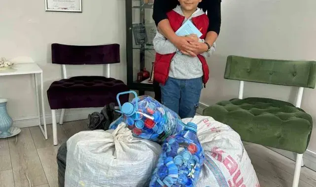7 yaşındaki öğrenci, engelliler için kapak topladı