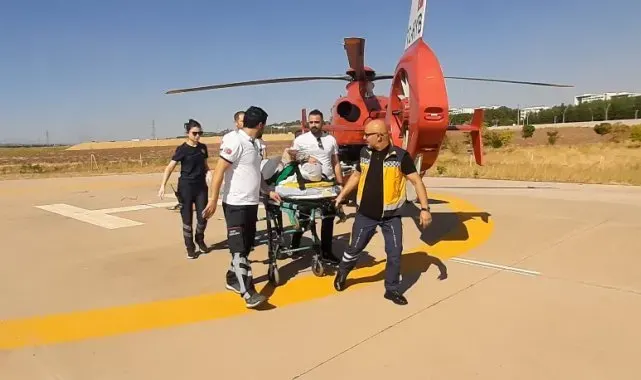 Kafasına demir düşen 83 yaşındaki hasta ambulans helikopterle hastaneye sevk edildi