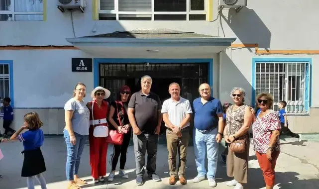 Çiftlikköy'de emekliler 15 öğrencinin okul giyim kıyafetlerini aldı