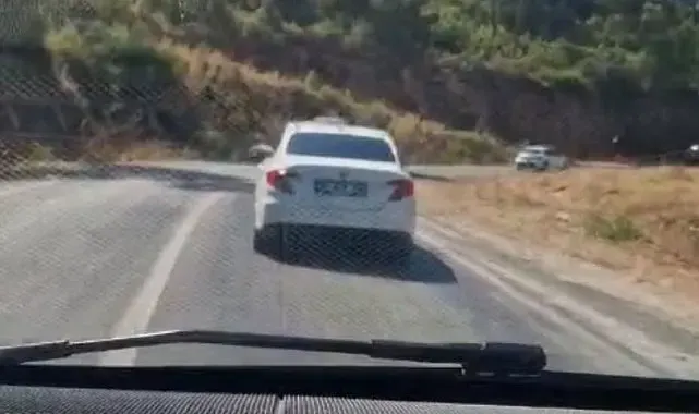 Marmaris'te araçtan ormana sigara izmariti atan şüpheliye adli işlem