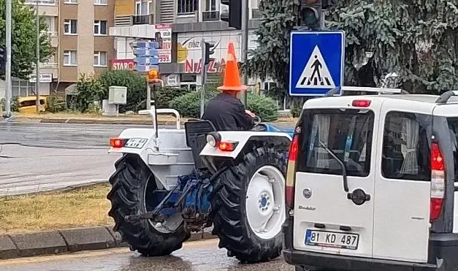 Bolu'da traktör sürücüsünden yağmura karşı 'dubalı' önlem